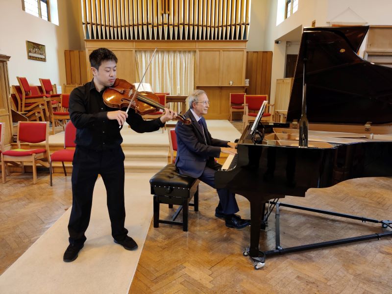 Piano and Violin musicians